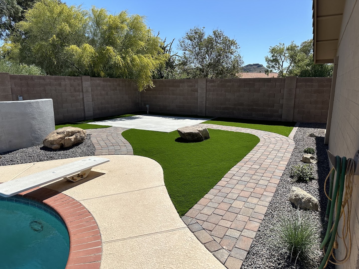 Desert backyard with turf and pool, West Valley AZ